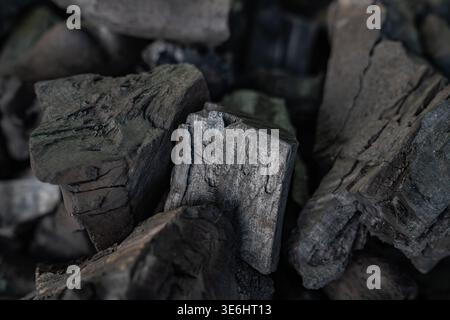 Close-Up of Charcoal Pieces Texture Background for BBQ and Fuel Use. High quality photo Stock Photo