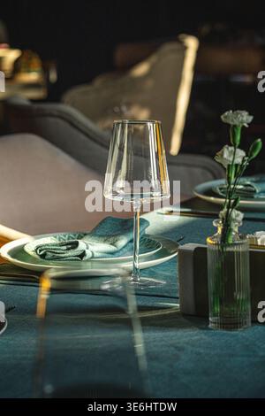 Elegant table setting with wine glass and decor Stock Photo