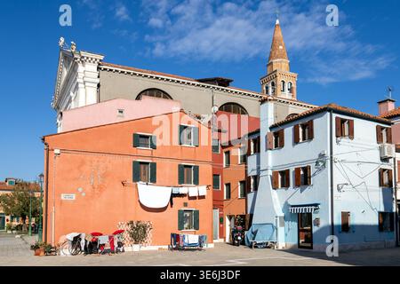 Colorful residential houses with hanging laundry and everyday life in Pellestrina, Venice, Italy Stock Photo
