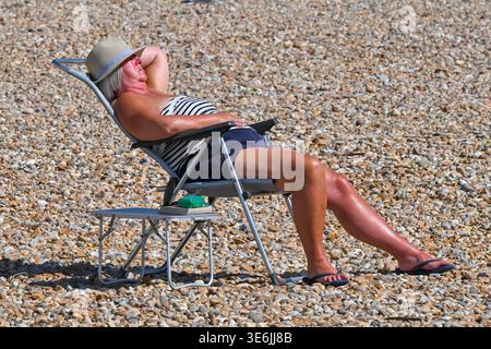 Lyme Regis, Dorset, UK. 7th April 2026. UK Weather. The beach is packed ...
