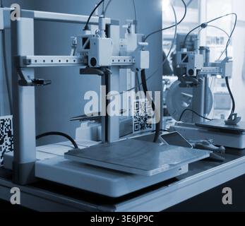 3D printer. 3D printer with blank work surface. Empty 3D printer. Modern new additive progressive technologies. 3D printing three-dimensional technology. Printing modeling manufacturing technology Stock Photo