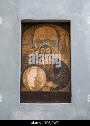 Mysterious Painting Of An Owl Next To A Globe In A Recess Of A Light Blue Wall, Prague, Czech Republic. Stock Photo