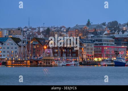 Scenic view of harbor at dusk, Tromso, Troms, Norway Stock Photo