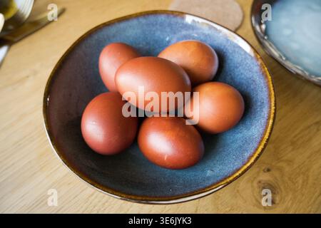 Boiled eggs, the shell color obtained after boiling in onion skins. Easter. Stock Photo