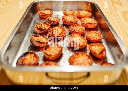 Oven Roasted Cherry Tomatoes In A Baking Tray Stock Photo