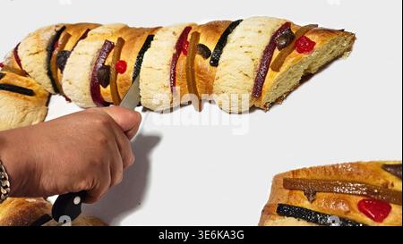 Rosca de Reyes is a traditional sweet bread decorated with crystallized fruits and hidden figures of the baby Jesus, which is shared with family Stock Photo