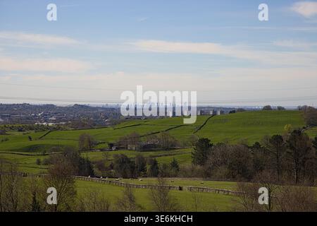 View From Watergrove Reservoir Looking Over Rochdale With The Skyline of Manchester in the Distance. Stock Photo
