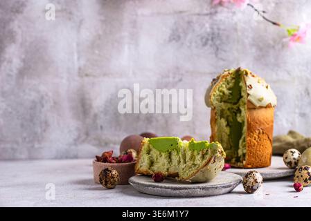 Traditional Easter cake kulich with pistachio Stock Photo