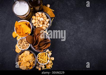 Beer and different snacks for Superbowl or football party Stock Photo