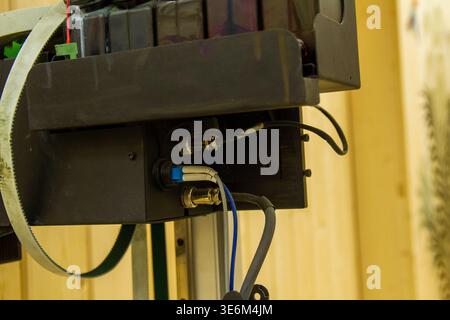 The image displays a close-up of a high-tech industrial or experimental apparatus, likely a component of a 3D printer or specialized imaging system Stock Photo