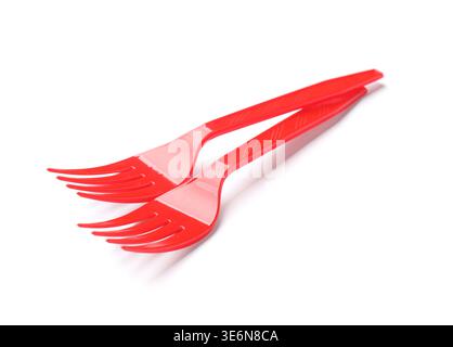 Two red plastic forks isolated on white Stock Photo