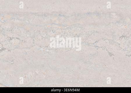 Close-up of a natural beige limestone surface. High-resolution texture ideal for bathroom tiles, luxury flooring, and interior design backgrounds Stock Photo