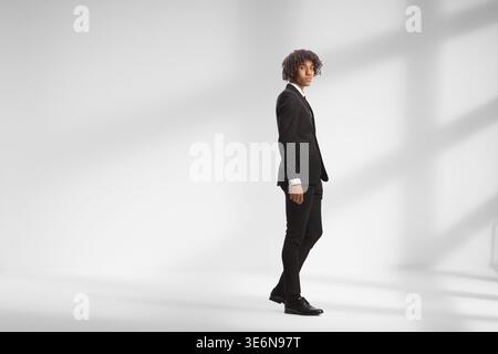 Full length shot of a young african american male model in a suit and tie Stock Photo