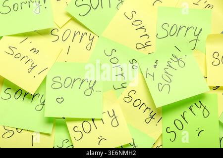 Sticky notes with word SORRY as background Stock Photo