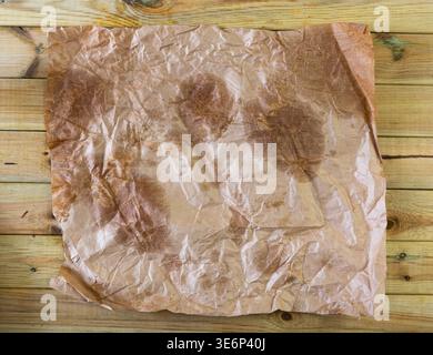 Vintage light brown crumpled paper sheet with stains Stock Photo