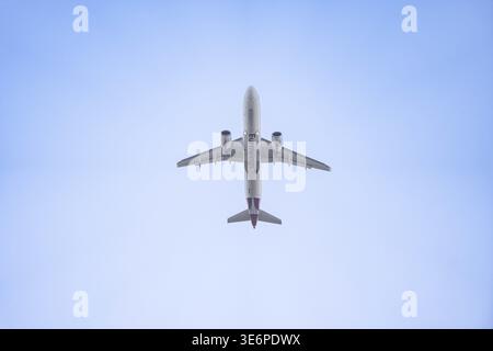 Eurowings aircraft flying over clear blue sky viewed from below, Stuttgart Airport, Germany Stock Photo