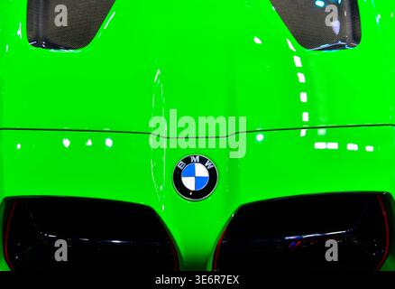 Thailand-March 26,2026: Close-up of the BMW logo emblem on a Signal Green hood of a BMW M3 CS high-performance sports sedan at the 47 Bangkok Internat Stock Photo