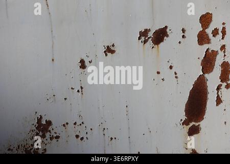 close up of painted metal surface. peeling paint Stock Photo