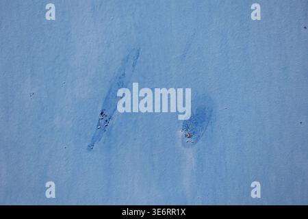 rusting metal door with blue paint, texture background Stock Photo