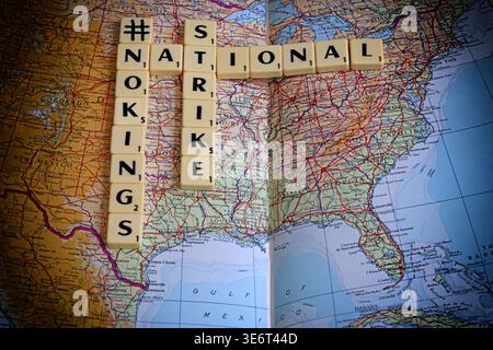 #NoKings No Kings and National Strike slogan spelled with Scrabble letters on a map of the United States of America. Stock Photo