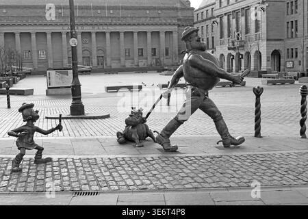 Desperate Dan, Dawg and Minnie the Minx statues in Dundee city centre, celebrating DC Thomson comics. Stock Photo