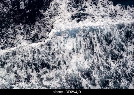 Sea wave foam texture, dark blue water background Stock Photo