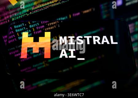 Paris, France - April 1, 2026: Logo of Mistral AI, the leading French generative artificial intelligence company, shown on a screen with code. Stock Photo