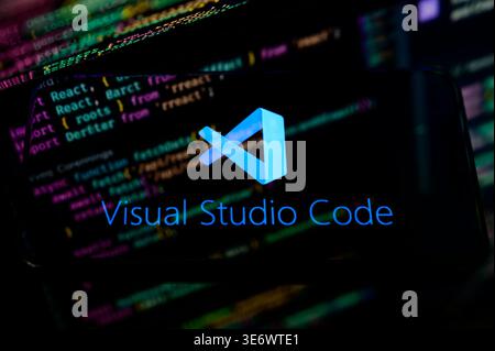 Paris, France - April 1, 2026: The Visual Studio Code (VS Code) logo on a smartphone screen, the world's most popular source-code editor. Stock Photo