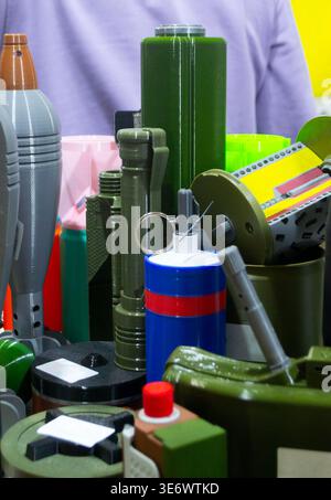 Models of various types of weapons, with RGN hand grenade printed on 3D printer. Prototype of ammunition printed on 3D printer. Innovation new modern additive technologies. 3D printing technology Stock Photo