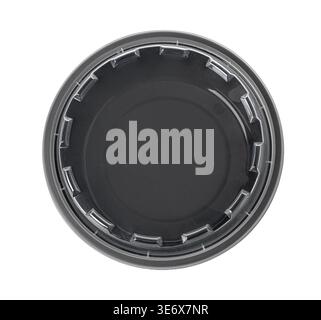 Round black plastic lid covering a disposable food container Stock Photo