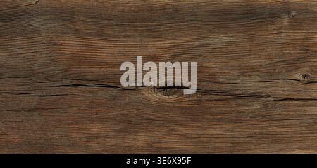 Dark brown weathered wood grain showing cracks and knots Stock Photo