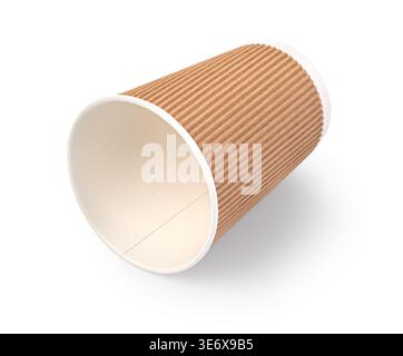 Disposable brown corrugated paper coffee cup lying on an isolated white background Stock Photo