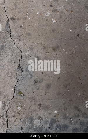 Rough Gray Cracked Concrete Surface Weathered Material Detail Subtle Dark Gradient Urban Aged Backdrop for Copy Space Stock Photo