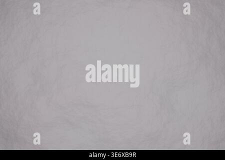 Abstract minimalist gray background with a subtle crumpled paper texture and soft shadows for design Stock Photo