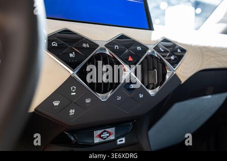 Zurich, Switzerland, October 10, 2025. Side perspective close up of the DS 3 diamond-shaped touch controls and engine start button at the Zurich Auto Stock Photo