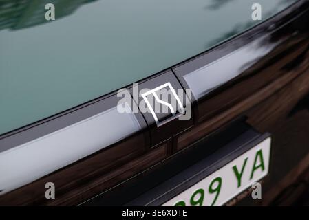 Kyiv, Ukraine. March 21, 2026. Close-up of the Zeekr logo of a modern electric vehicle with a green and black body. Stock Photo