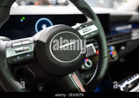 Zurich, Switzerland, October 10, 2025. Detail shot of the multi-function steering wheel and digital cockpit of a Hyundai Tucson at the Zurich Auto Sho Stock Photo