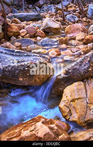 Small Winter Waterfall and Rocky Stream in Ice Box Canyon Stock Photo