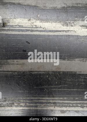 Brushed Steel Surface With Horizontal Scratches, Weathered Paint Layers And Subtle Streaks Industrial Backdrop For Architectural Or Product Layouts, W Stock Photo