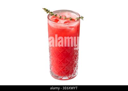 Red watermelon lemonade with thyme herb garnish and ice in crystal highball glass isolated on white background Stock Photo