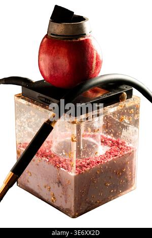 Creative hookah with apple fruit bowl charcoal and transparent acrylic base with berry powder and gold flakes isolated on white background Stock Photo