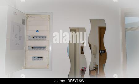 Electrical panel with circuit breakers in home, household electricity distribution box Stock Photo