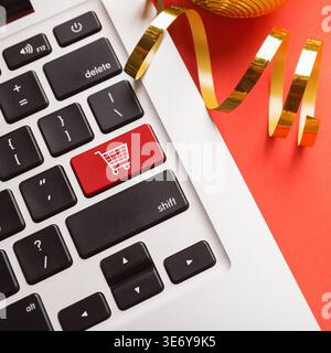 Laptop keyboard with icon shopping cart closeup Stock Photo