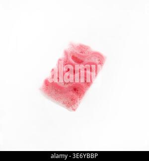 Sponge with soap sud on glass isolated Stock Photo