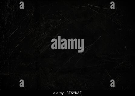 Dark textured background with subtle scratches and marks, creating a moody and dramatic surface ideal for design and artistic applications Stock Photo