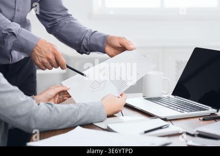 Analytical team working with financial results at meeting Stock Photo