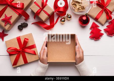 Woman hands holding empty Christmas gift box Stock Photo