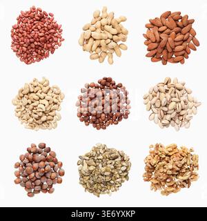 Collection of assorted nuts isolated on white background Stock Photo