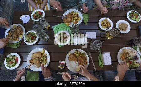 Set table, food and drinks served on a table in a beer garden, Lower Franconia, Bavaria, Germany Stock Photo
