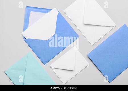 Composition with different envelopes on white background, closeup Stock Photo